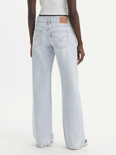 Levi's A74980007 Womens Superlow Loose Jeans Abraided Art Light Blue back view. If you need any assistance with this item or the purchase of this item please call us at five six one seven four eight eight eight zero one Monday through Saturday 10:00a.m EST to 8:00 p.m EST