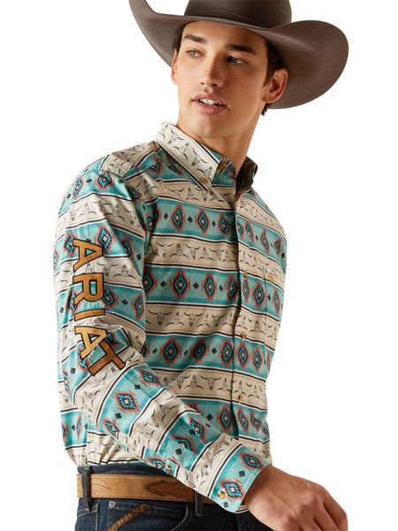 Ariat 10047347 Mens Team Cruz Fitted Shirt Sandshell  Teal sleeve view. If you need any assistance with this item or the purchase of this item please call us at five six one seven four eight eight eight zero one Monday through Saturday 10:00a.m EST to 8:00 p.m EST