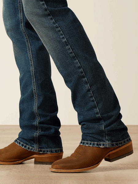 Ariat 10061743 Mens M7 Slim Sawyer Classic Rise Straight Leg Jeans Norris Blue legs view. If you need any assistance with this item or the purchase of this item please call us at five six one seven four eight eight eight zero one Monday through Saturday 10:00a.m EST to 8:00 p.m EST