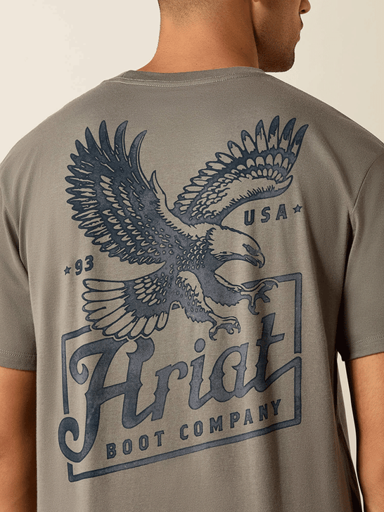 Ariat 10071193 Mens Patriot T-Shirt Smoke Pearl close up. If you need any assistance with this item or the purchase of this item please call us at five six one seven four eight eight eight zero one Monday through Saturday 10:00a.m EST to 8:00 p.m EST