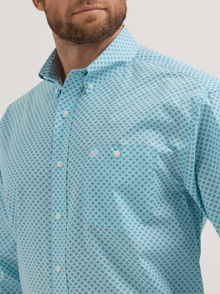 Wrangler 112355323 Mens Long Sleeve Relaxed Fit Western Shirt Light Blue front close up. If you need any assistance with this item or the purchase of this item please call us at five six one seven four eight eight eight zero one Monday through Saturday 10:00a.m EST to 8:00 p.m EST