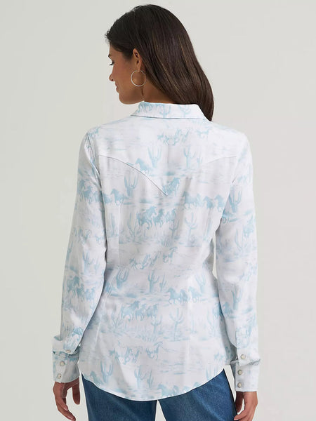 Wrangler 112375191 Womens Country Toile Western Slim Snap Shirt Light Blue back view. If you need any assistance with this item or the purchase of this item please call us at five six one seven four eight eight eight zero one Monday through Saturday 10:00a.m EST to 8:00 p.m EST