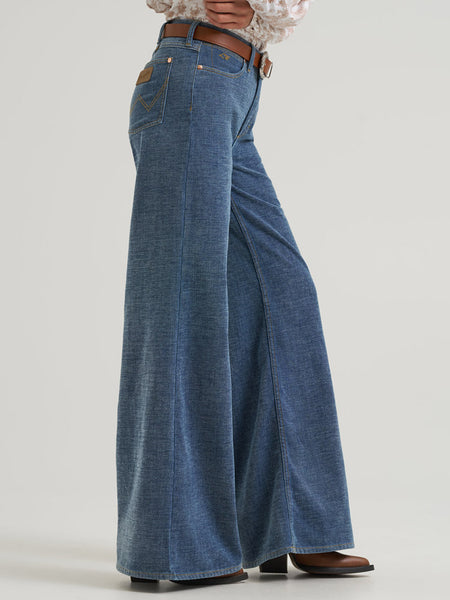 Wrangler 112382902 Womens X Lainey Wilson Cheeky Wide Leg Jean Chenille side view. If you need any assistance with this item or the purchase of this item please call us at five six one seven four eight eight eight zero one Monday through Saturday 10:00a.m EST to 8:00 p.m EST