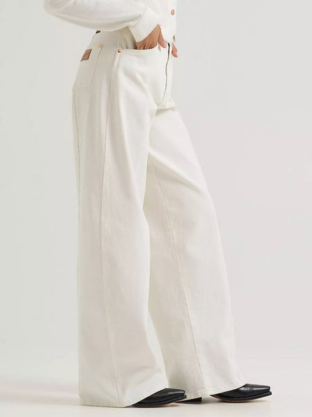 Wrangler 112385581 Womens Lainey Wilson X Tour Barrel Jean Pearl White side view. If you need any assistance with this item or the purchase of this item please call us at five six one seven four eight eight eight zero one Monday through Saturday 10:00a.m EST to 8:00 p.m EST