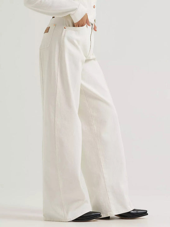 Wrangler 112385581 Womens Lainey Wilson X Tour Barrel Jean Pearl White side view. If you need any assistance with this item or the purchase of this item please call us at five six one seven four eight eight eight zero one Monday through Saturday 10:00a.m EST to 8:00 p.m EST