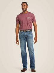 Ariat 10021879 Mens M5 Slim Stretch Stillwell Stackable Straight Leg Jean Fargo full front view of model. If you need any assistance with this item or the purchase of this item please call us at five six one seven four eight eight eight zero one Monday through Saturday 10:00a.m EST to 8:00 p.m EST