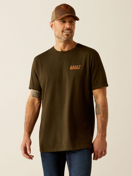 Ariat 10054843 Mens Armadillo on a Half Shell T-Shirt Dark Olive front view. If you need any assistance with this item or the purchase of this item please call us at five six one seven four eight eight eight zero one Monday through Saturday 10:00a.m EST to 8:00 p.m EST