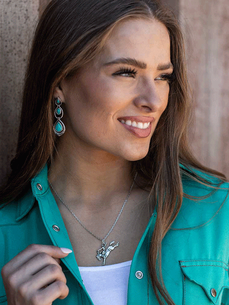 Montana Silversmiths ER5638 Womens Unmatched Beauty Turquoise Earrings Silver on model. If you need any assistance with this item or the purchase of this item please call us at five six one seven four eight eight eight zero one Monday through Saturday 10:00a.m EST to 8:00 p.m EST