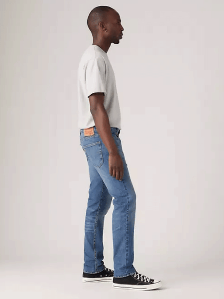 Levi's 045114908 Mens 511 Slim Fit Flex Jeans Mother Load Medium Wash side view. If you need any assistance with this item or the purchase of this item please call us at five six one seven four eight eight eight zero one Monday through Saturday 10:00a.m EST to 8:00 p.m EST