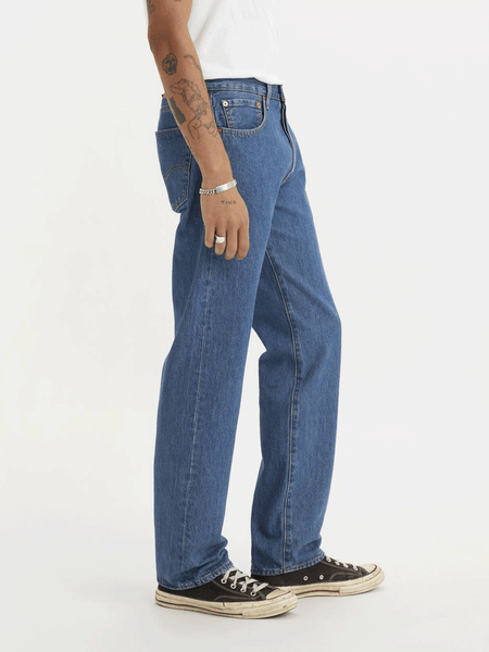 Levi’s 005010193 Mens 501 Original Fit Jeans Medium Stonewash side view. If you need any assistance with this item or the purchase of this item please call us at five six one seven four eight eight eight zero one Monday through Saturday 10:00a.m EST to 8:00 p.m EST