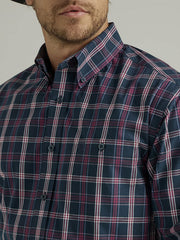 Wrangler 112331817 Mens George Strait Long Sleeve Shirt Navy Fuschia Plaid front view close up. If you need any assistance with this item or the purchase of this item please call us at five six one seven four eight eight eight zero one Monday through Saturday 10:00a.m EST to 8:00 p.m EST