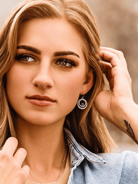 Montana Silversmiths ER6104 Womens Enchanted Soul Earrings Silver on model. If you need any assistance with this item or the purchase of this item please call us at five six one seven four eight eight eight zero one Monday through Saturday 10:00a.m EST to 8:00 p.m EST