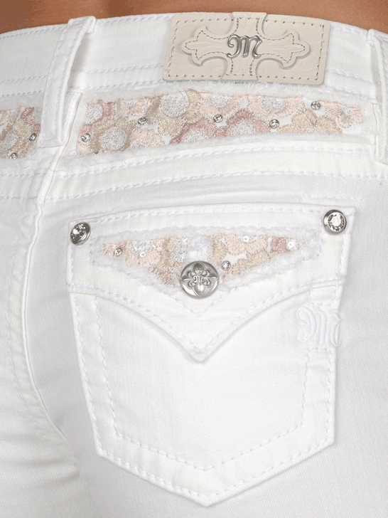 Miss Me M9309H Womens Mid-Rise Shorts White close up view of back pocket. If you need any assistance with this item or the purchase of this item please call us at five six one seven four eight eight eight zero one Monday through Saturday 10:00a.m EST to 8:00 p.m EST
