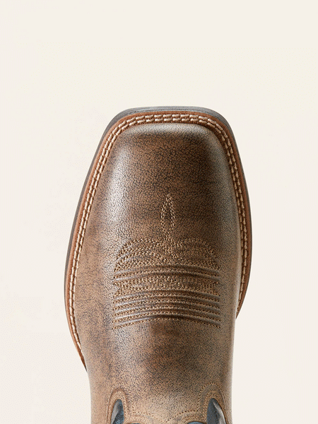 Ariat 10053578 Mens Brush Creek Cowboy Boot Stone Brown toe view. If you need any assistance with this item or the purchase of this item please call us at five six one seven four eight eight eight zero one Monday through Saturday 10:00a.m EST to 8:00 p.m EST