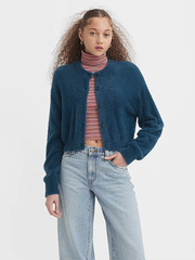 Levis A32350006 Womens Cat Cardigan Sweater Gibralter Sea Blue front view on model. If you need any assistance with this item or the purchase of this item please call us at five six one seven four eight eight eight zero one Monday through Saturday 10:00a.m EST to 8:00 p.m EST