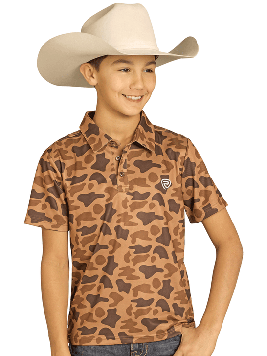 Rock & Roll Denim BB51T07687 Kids Camo Printed Polo Copper front view. If you need any assistance with this item or the purchase of this item please call us at five six one seven four eight eight eight zero one Monday through Saturday 10:00a.m EST to 8:00 p.m EST