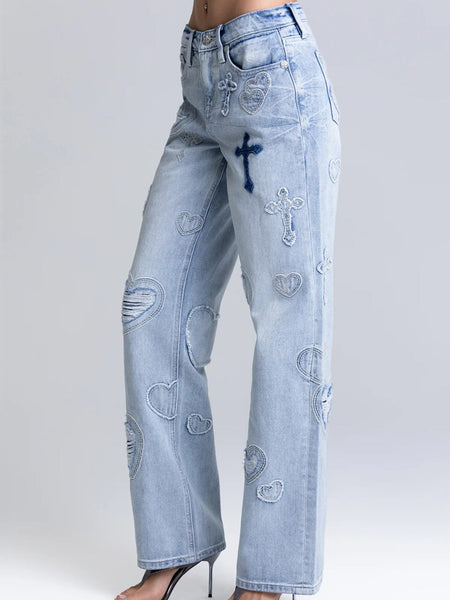 Miss Me M2410SWV Womens Aryanna Heart Cross Slim Wide Light Blue left side view. If you need any assistance with this item or the purchase of this item please call us at five six one seven four eight eight eight zero one Monday through Saturday 10:00a.m EST to 8:00 p.m EST