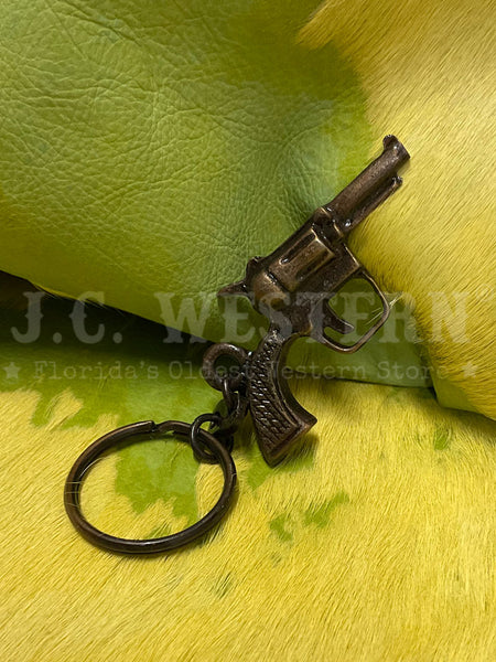 Fashionwest KC-47C Revolver Keychain Copper front view. If you need any assistance with this item or the purchase of this item please call us at five six one seven four eight eight eight zero one Monday through Saturday 10:00a.m EST to 8:00 p.m EST