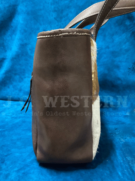 Ariat A770008002 Womens Calf Hair Patchwork Savannah Collection Tote Brown side view. If you need any assistance with this item or the purchase of this item please call us at five six one seven four eight eight eight zero one Monday through Saturday 10:00a.m EST to 8:00 p.m EST