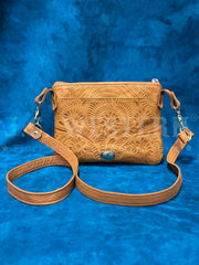 American West 1515884 Ladies Hand Tooled Hip Crossbody Leather Bag Tan front view with strap. If you need any assistance with this item or the purchase of this item please call us at five six one seven four eight eight eight zero one Monday through Saturday 10:00a.m EST to 8:00 p.m EST