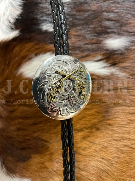 Fashionwest AC70G Crossed Pistols Western Bolo Tie Gold And Silver close up. If you need any assistance with this item or the purchase of this item please call us at five six one seven four eight eight eight zero one Monday through Saturday 10:00a.m EST to 8:00 p.m EST