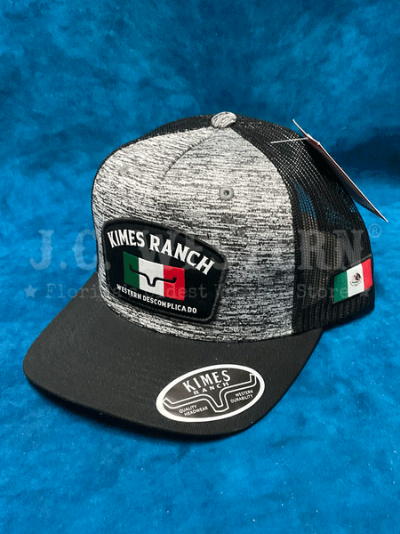 Kimes Ranch BANDERA TRUCKER Mesh Back Cap Heather Grey front and side view.If you need any assistance with this item or the purchase of this item please call us at five six one seven four eight eight eight zero one Monday through Saturday 10:00a.m EST to 8:00 p.m EST