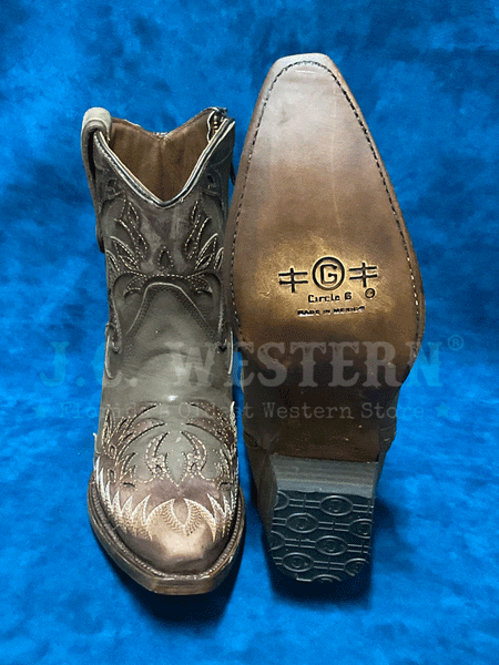 Circle G L6100 Ladies Embroidery Wing Tip Zipper Ankle Boot Bark sole and front view. If you need any assistance with this item or the purchase of this item please call us at five six one seven four eight eight eight zero one Monday through Saturday 10:00a.m EST to 8:00 p.m EST