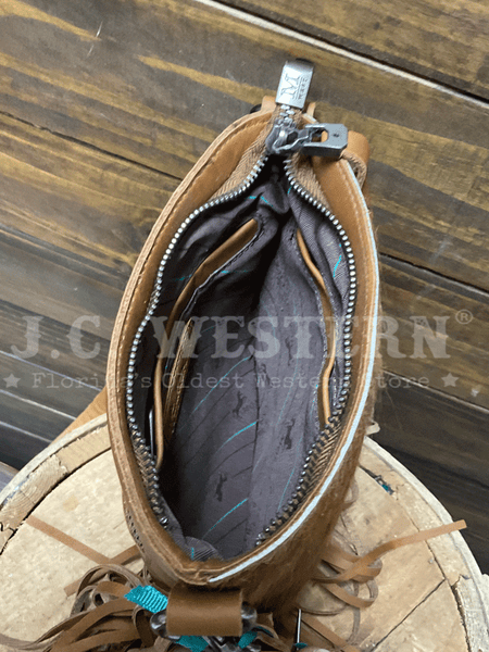 Montana West RLC-L186BR Womens Genuine Leather Hair On Fringe Crossbody Brown inside view. If you need any assistance with this item or the purchase of this item please call us at five six one seven four eight eight eight zero one Monday through Saturday 10:00a.m EST to 8:00 p.m EST