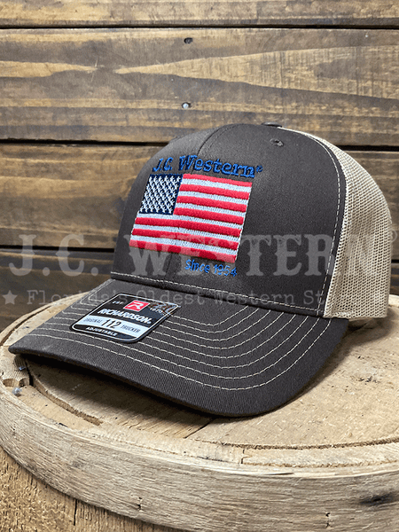 JC Western JCH3 Trucker Cap Dark Brown front / side view. If you need any assistance with this item or the purchase of this item please call us at five six one seven four eight eight eight zero one Monday through Saturday 10:00a.m EST to 8:00 p.m EST