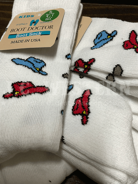 Boot Doctor 0421305 Kids Crew COWBOY HATS Socks White close up different sizes. If you need any assistance with this item or the purchase of this item please call us at five six one seven four eight eight eight zero one Monday through Saturday 10:00a.m EST to 8:00 p.m EST