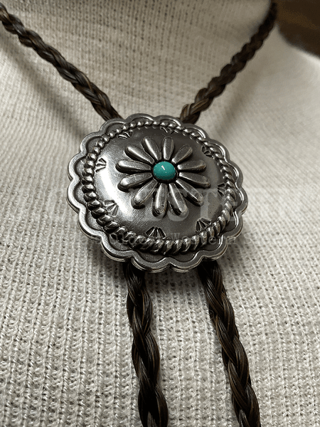Cowboy Collectibles BOLW512 Turquoise Sunflower Bolo Tie Dark Sorrel close up. If you need any assistance with this item or the purchase of this item please call us at five six one seven four eight eight eight zero one Monday through Saturday 10:00a.m EST to 8:00 p.m EST