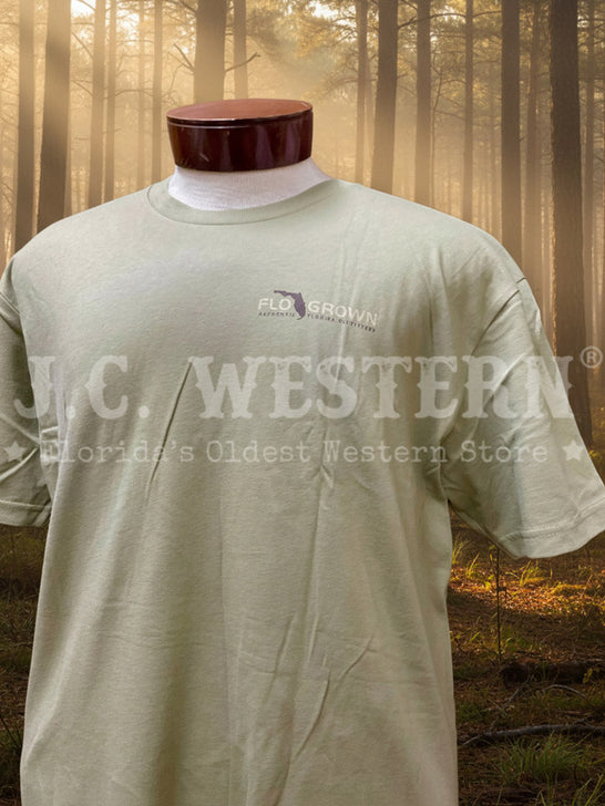FloGrown FGM1-1123 Mens Hogs & Dogs Tee Olive front view. If you need any assistance with this item or the purchase of this item please call us at five six one seven four eight eight eight zero one Monday through Saturday 10:00a.m EST to 8:00 p.m EST