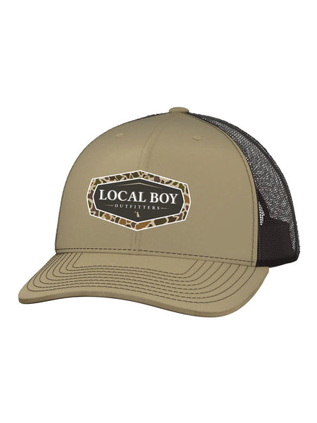 Local Boy Outfitters L3000421-KHC Mens Vintage Emblem Trucker Hat Khaki front view. If you need any assistance with this item or the purchase of this item please call us at five six one seven four eight eight eight zero one Monday through Saturday 10:00a.m EST to 8:00 p.m EST