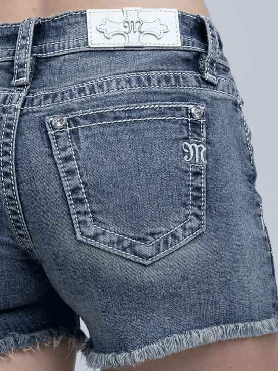 Miss Me M9606H Womens Dilrose Crystal Horse Shorts Medium Wash close up. If you need any assistance with this item or the purchase of this item please call us at five six one seven four eight eight eight zero one Monday through Saturday 10:00a.m EST to 8:00 p.m EST