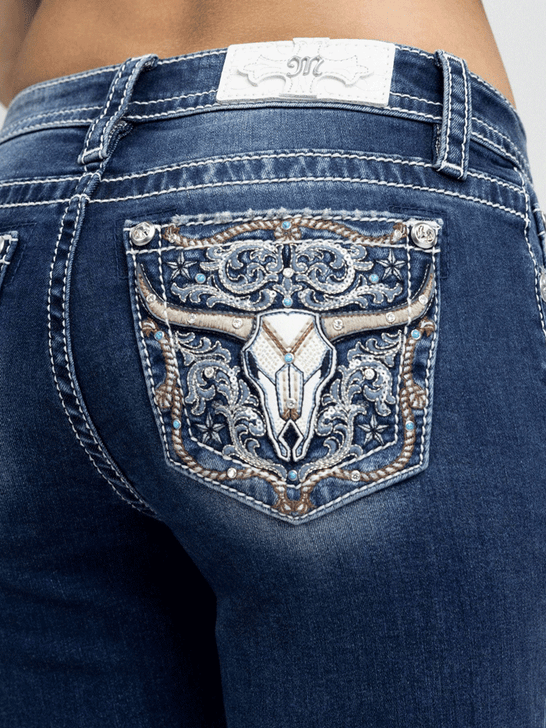 Miss Me M9610B Womens Mid Rise Bootcut Jean Dark Wash close up. If you need any assistance with this item or the purchase of this item please call us at five six one seven four eight eight eight zero one Monday through Saturday 10:00a.m EST to 8:00 p.m EST