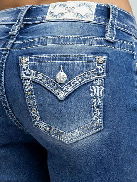 Miss Me M9623BV Womens Mid Rise Bootcut Jeans Medium Blue close up. If you need any assistance with this item or the purchase of this item please call us at five six one seven four eight eight eight zero one Monday through Saturday 10:00a.m EST to 8:00 p.m EST