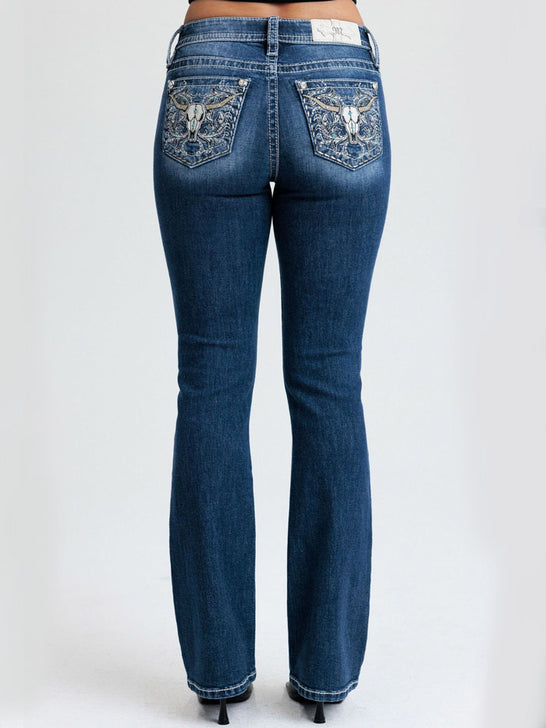 Miss Me M9707BL Womens Mid Rise Bootcut Jean Dark Blue back view. If you need any assistance with this item or the purchase of this item please call us at five six one seven four eight eight eight zero one Monday through Saturday 10:00a.m EST to 8:00 p.m EST
