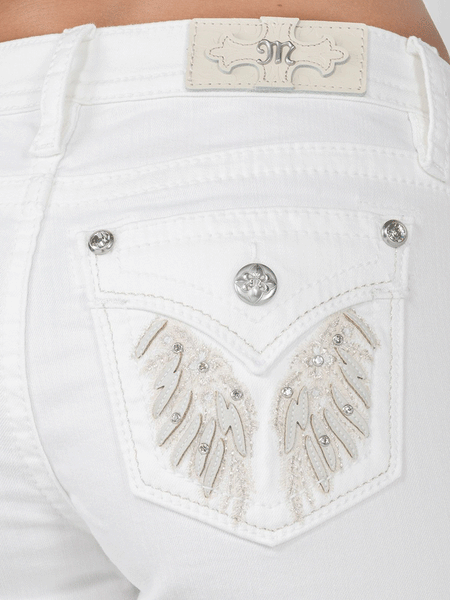 Miss Me M5082H159 Womens Mid-Rise Embellished Wing Short White back pocket close up view. If you need any assistance with this item or the purchase of this item please call us at five six one seven four eight eight eight zero one Monday through Saturday 10:00a.m EST to 8:00 p.m EST