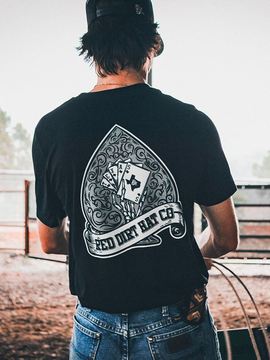 Red Dirt RDHC-T-173 Mens Hold ‘Em Tee Black back view. If you need any assistance with this item or the purchase of this item please call us at five six one seven four eight eight eight zero one Monday through Saturday 10:00a.m EST to 8:00 p.m EST