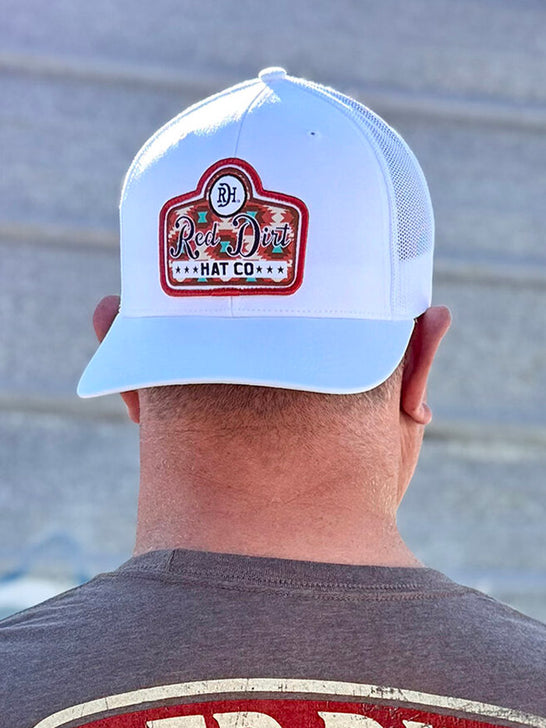 Red Dirt RDHC-577 GUSSIED UP Trucker Cap White on model. If you need any assistance with this item or the purchase of this item please call us at five six one seven four eight eight eight zero one Monday through Saturday 10:00a.m EST to 8:00 p.m EST