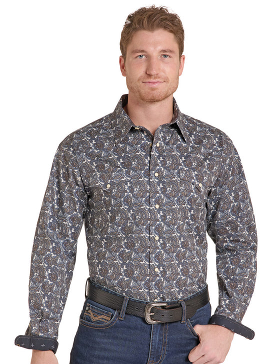 A man wearing a long-sleeve button-down western shirt with a dark gray and blue abstract pattern, paired with blue jeans and a black belt, against a plain white background. If you need any assistance with this item or the purchase of this item please call us at five six one seven four eight eight eight zero one Monday through Saturday 10:00a.m EST to 8:00 p.m EST