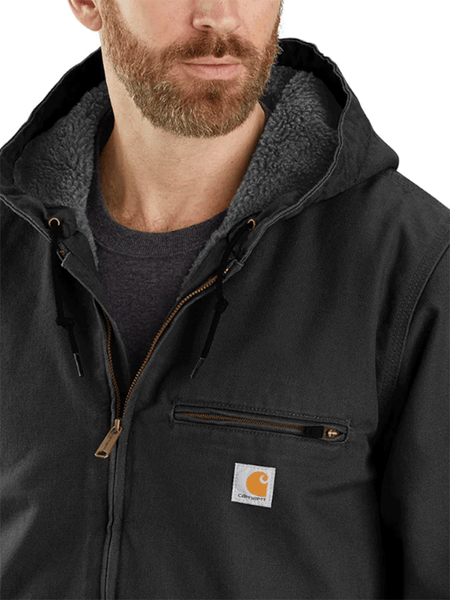 Carhartt 104392-BLK Mens Washed Duck Sherpa Lined Jacket Black close up. If you need any assistance with this item or the purchase of this item please call us at five six one seven four eight eight eight zero one Monday through Saturday 10:00a.m EST to 8:00 p.m EST