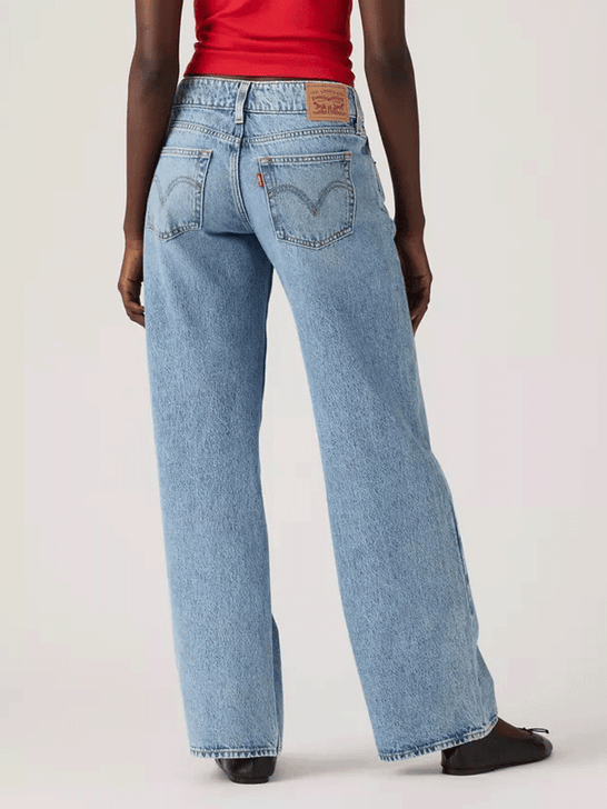 Levi's A74980019 Womens Superlow Loose Jeans Twisted Vibe Light Blue back view. If you need any assistance with this item or the purchase of this item please call us at five six one seven four eight eight eight zero one Monday through Saturday 10:00a.m EST to 8:00 p.m EST