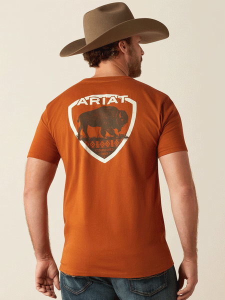 Ariat 10053992 Mens Buffalo West T-Shirt Burnt Umber Copper back view. If you need any assistance with this item or the purchase of this item please call us at five six one seven four eight eight eight zero one Monday through Saturday 10:00a.m EST to 8:00 p.m EST