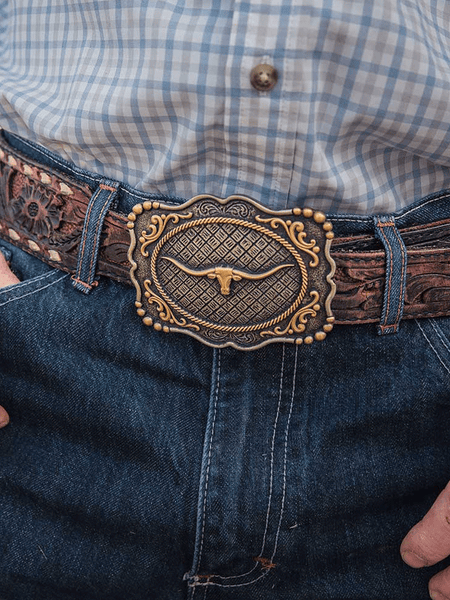 Montana Silversmiths A1003P Framed Longhorn Attitude Buckle Antique Silver on model. If you need any assistance with this item or the purchase of this item please call us at five six one seven four eight eight eight zero one Monday through Saturday 10:00a.m EST to 8:00 p.m EST