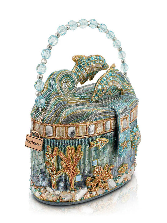 Mary Frances BAG 25-176 CRYSTAL DOLPHIN Top Handle Handbag Light Blue left side view. If you need any assistance with this item or the purchase of this item please call us at five six one seven four eight eight eight zero one Monday through Saturday 10:00a.m EST to 8:00 p.m EST