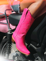 Corral Z5138 Ladies Embroidery Western Boot Fuchsia on model. If you need any assistance with this item or the purchase of this item please call us at five six one seven four eight eight eight zero one Monday through Saturday 10:00a.m EST to 8:00 p.m EST
