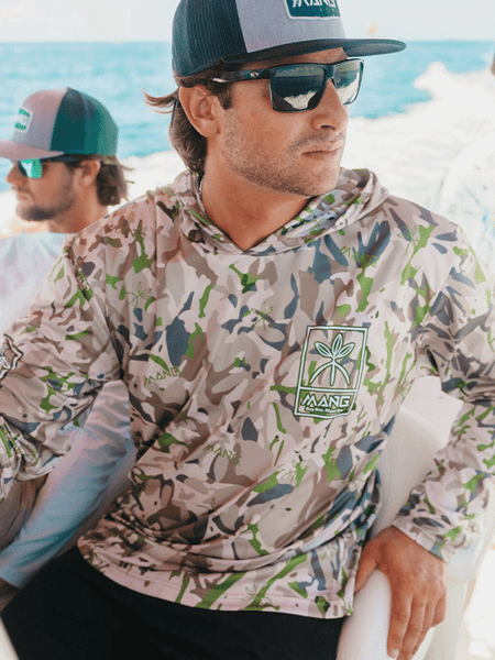 MANG MP1261H Mens Duck Mangroflage Hoodie Camo on model. If you need any assistance with this item or the purchase of this item please call us at five six one seven four eight eight eight zero one Monday through Saturday 10:00a.m EST to 8:00 p.m EST