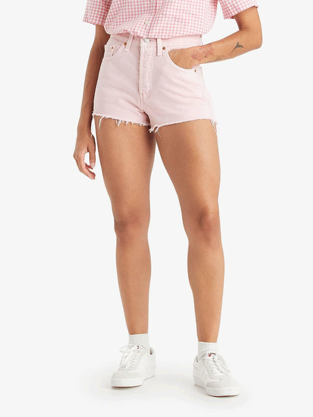 Levi's 563270398 Womens 501 Original Shorts Pink front view on model. If you need any assistance with this item or the purchase of this item please call us at five six one seven four eight eight eight zero one Monday through Saturday 10:00a.m EST to 8:00 p.m EST