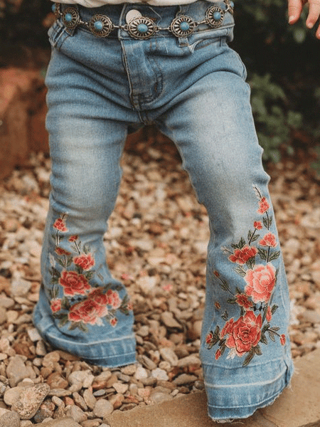 Shea Baby SBD12 Kids Floral Denim Flare Jeans Light Blue front view on infant model. If you need any assistance with this item or the purchase of this item please call us at five six one seven four eight eight eight zero one Monday through Saturday 10:00a.m EST to 8:00 p.m EST